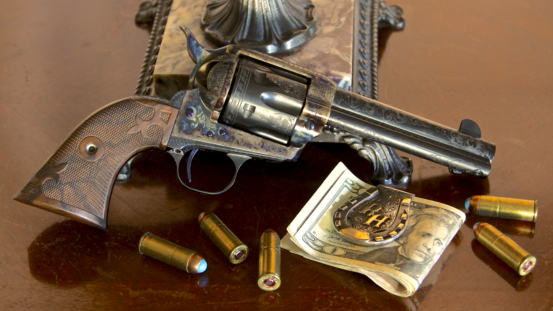 Standard Manufacturing Single Action revolver shown on bedstand with lamp base bullets ammo money