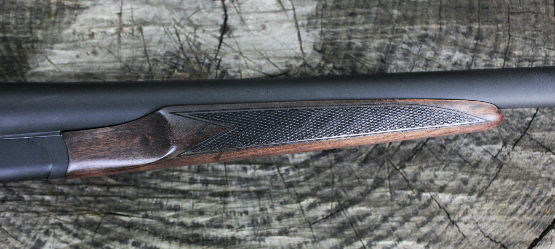 Heritage Badlander shotgun fore-end walnut wood detail closeup log black steel barrels