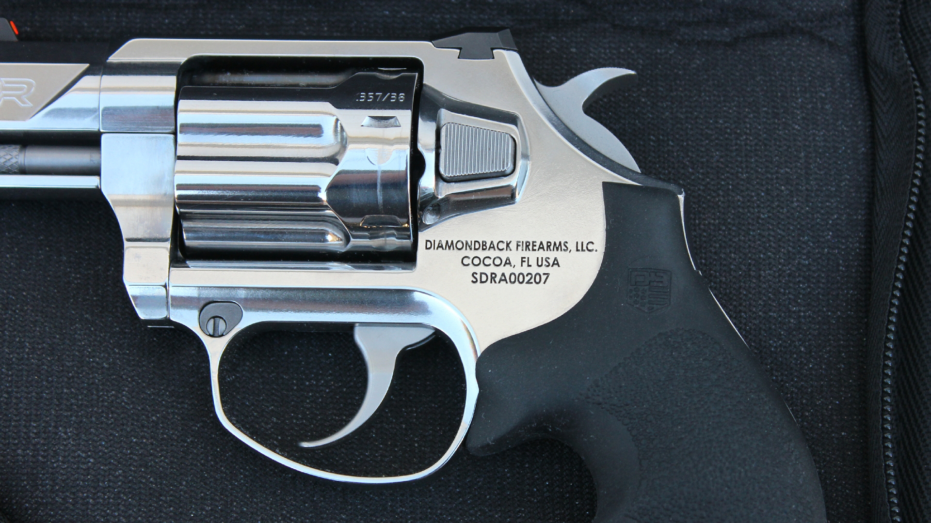 Diamonback Firearms SDR revolver left-side close-up cylinder frame stainless steel stamp gun in zippered case