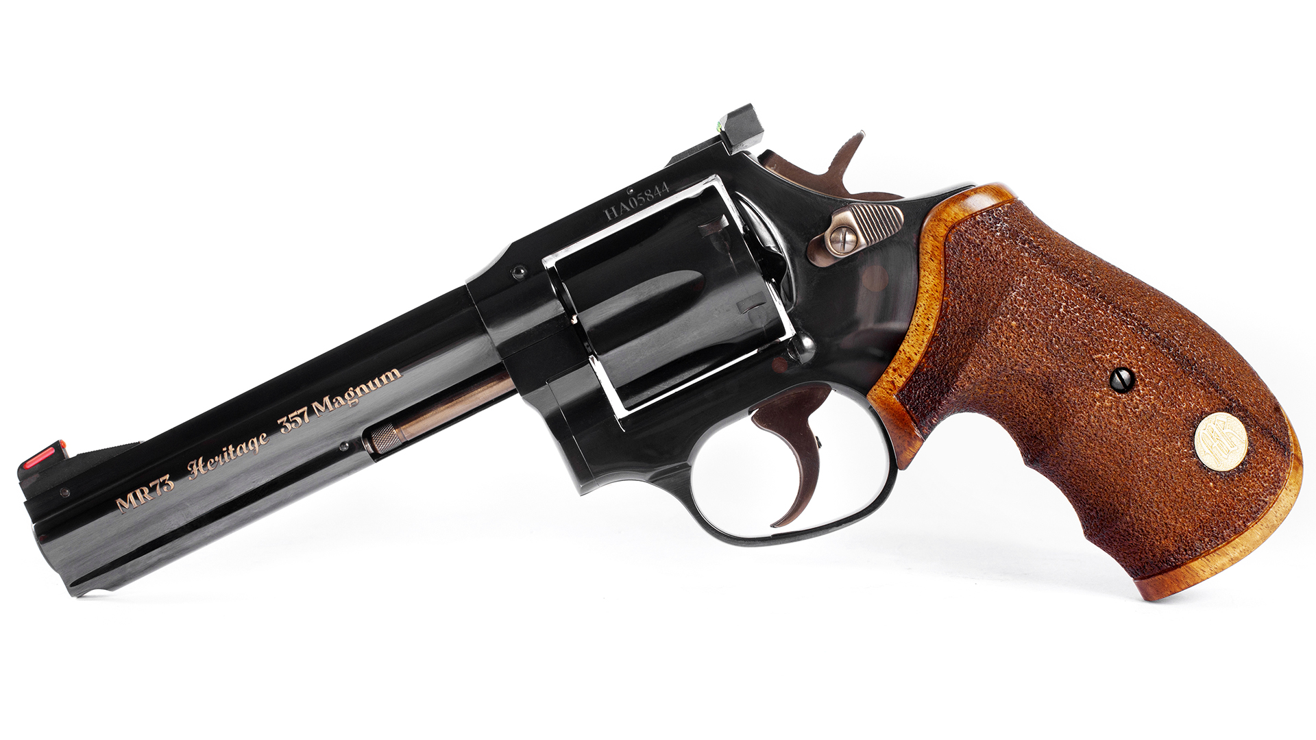 50th anniversary MR73 special edition revolver left-side view with gloss blue finish and custom walnut stocks