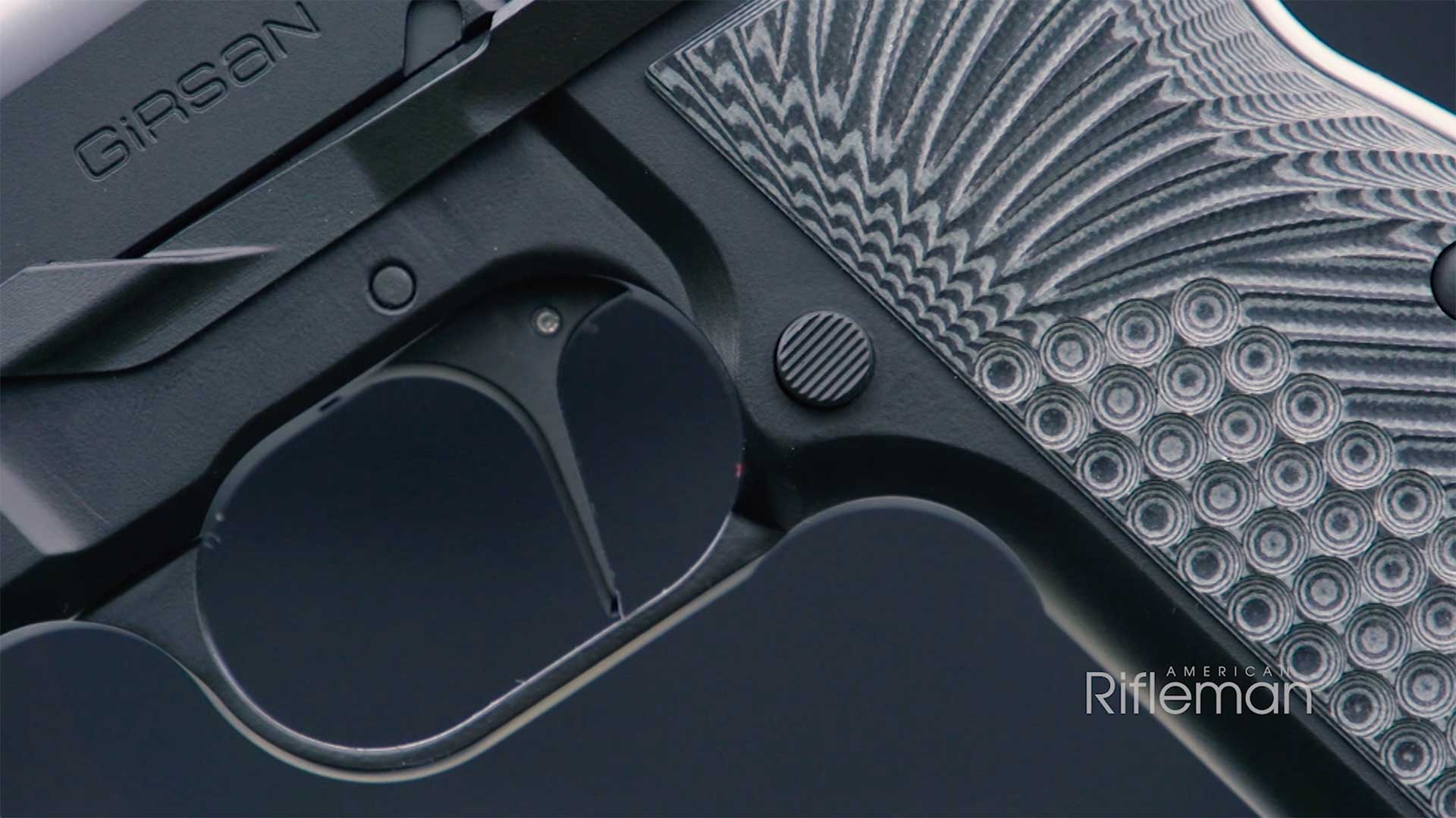 The flat-faced trigger, push-button magazine release and G10 grips on the all-black EAA Girsan MCP35 PI Ops.