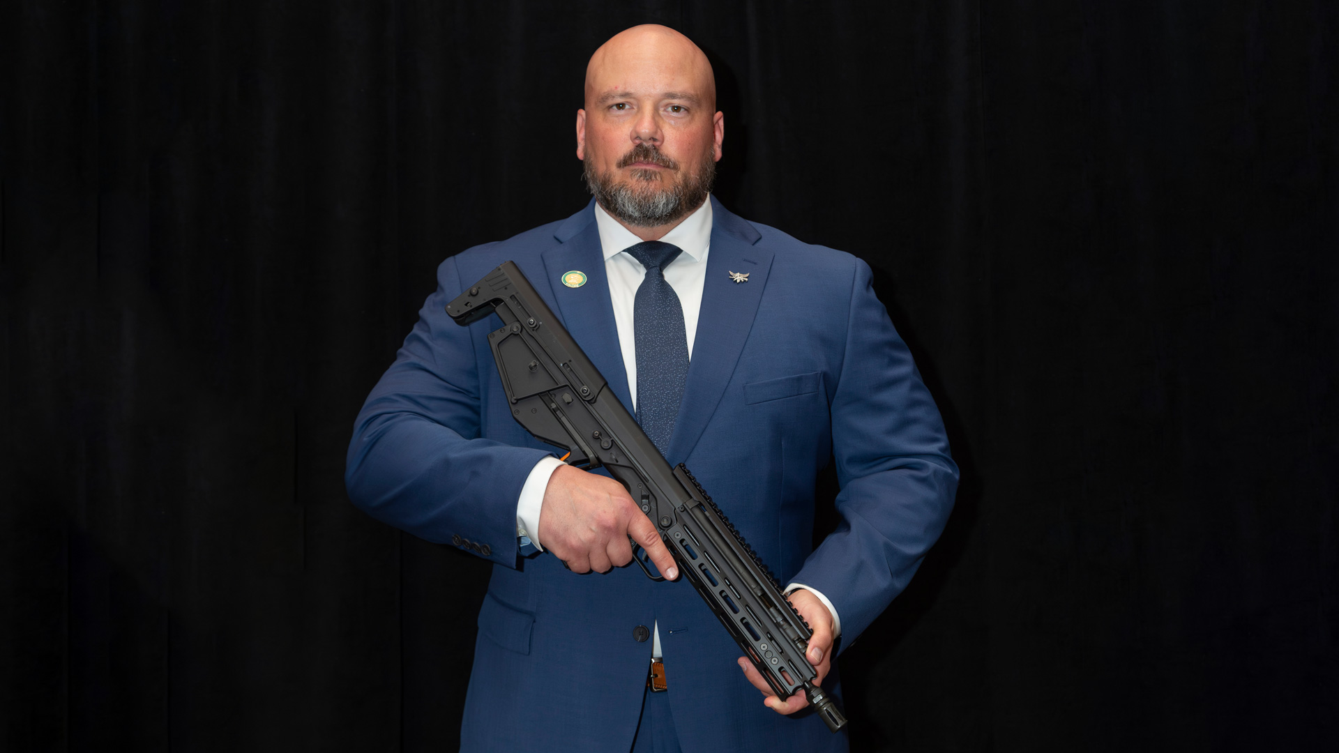 Sgt. Zaliponi is shown holding an RBD Defender rifle